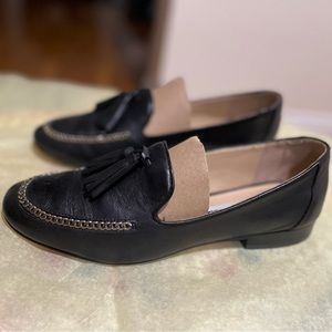 Karl Lagerfeld Paris black leather and tassel flat loafer.